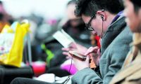 互聯網改造春節(jié)：短信拜年OUT了 微信紅包正當紅